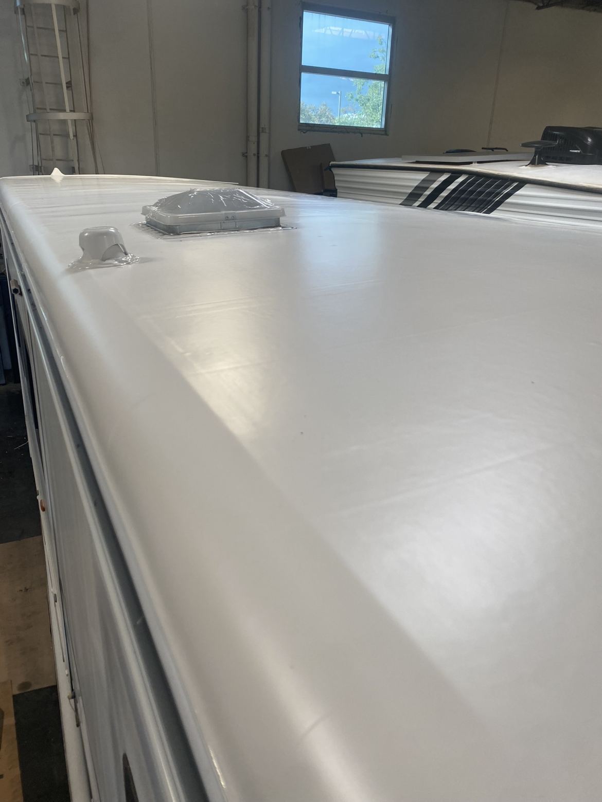 RV roof after repair, new membrane closeup
