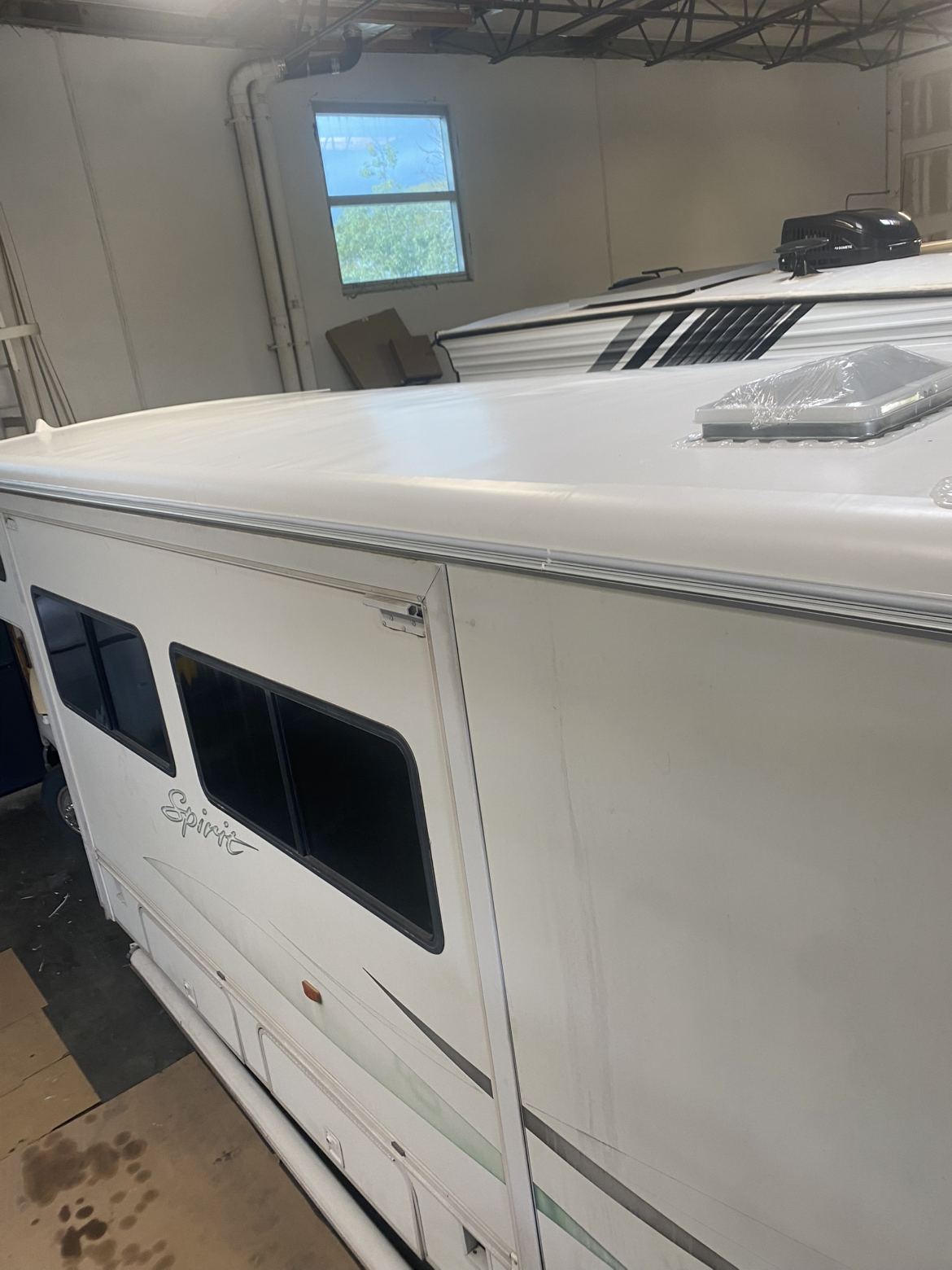 RV roof after repair, finished side view